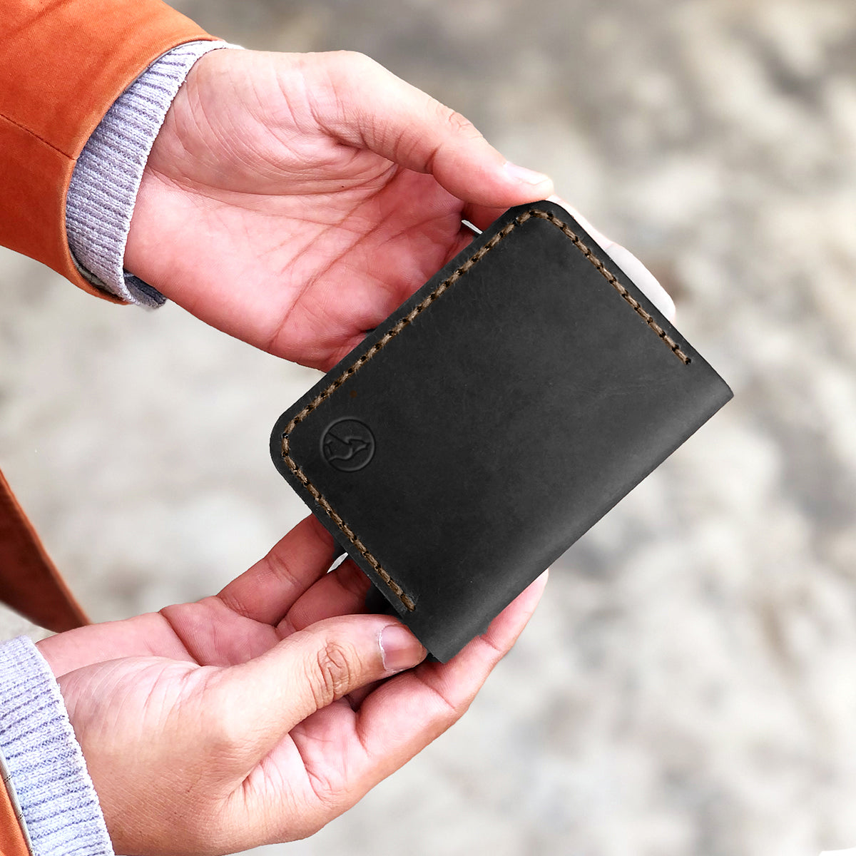The Vertical Convenience: A Leather Bifold Wallet