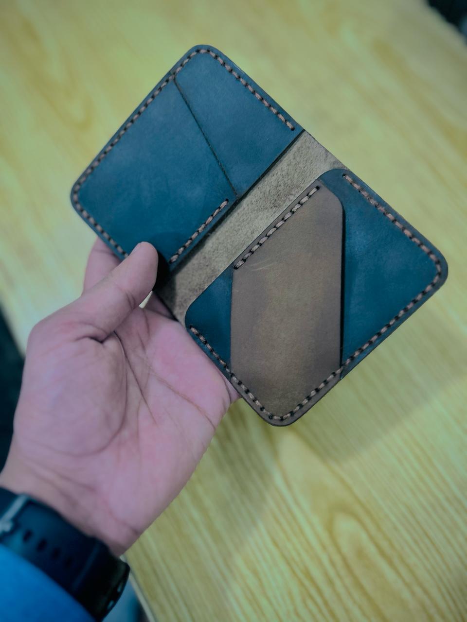 The Vertical Vogue: A Bifold Leather Wallet