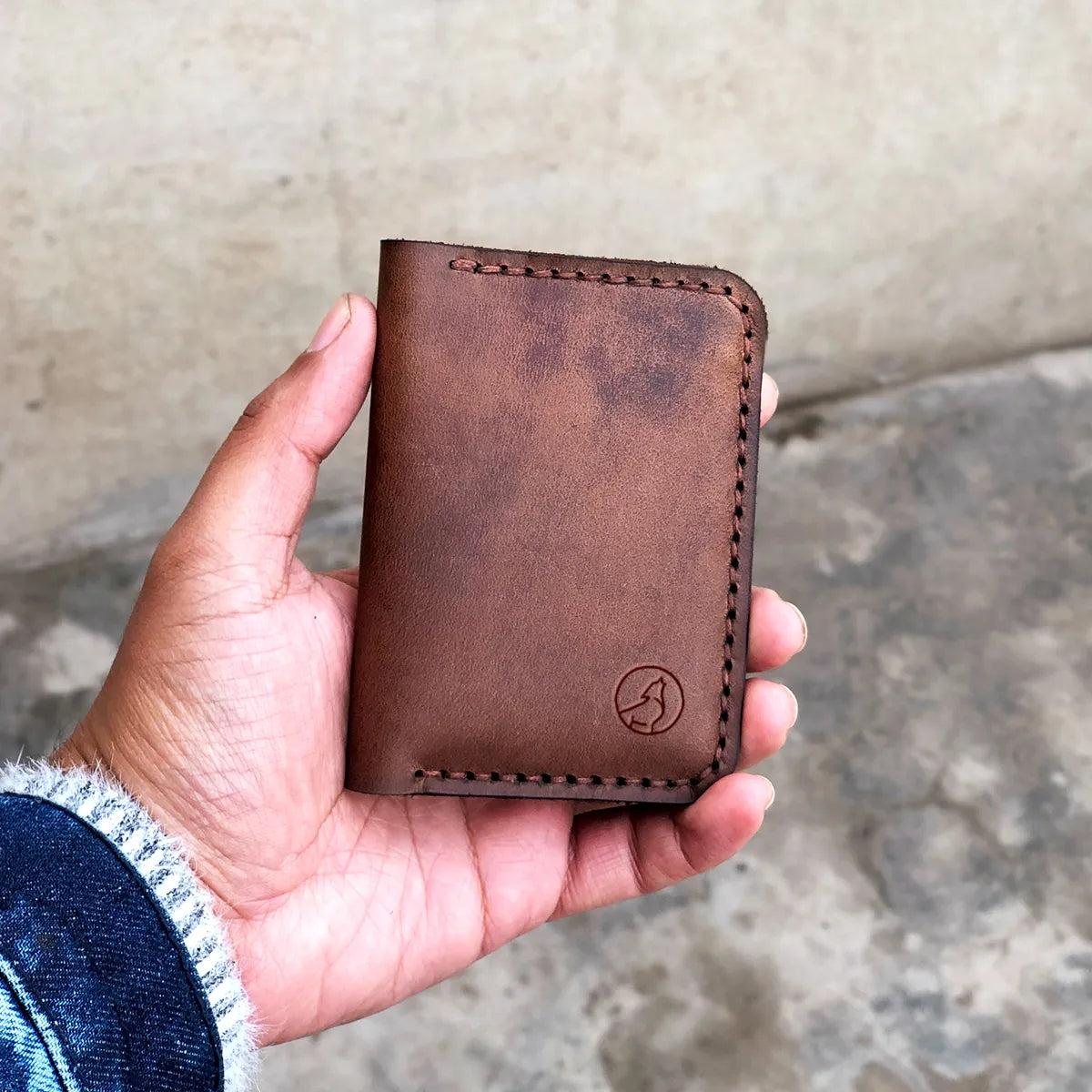 The Vertical Vogue: A Bifold Leather Wallet