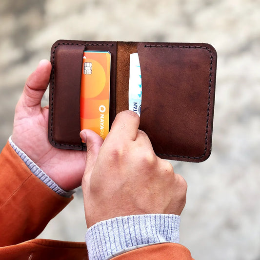 The Vertical Convenience: A Leather Bifold Wallet wolf.pk