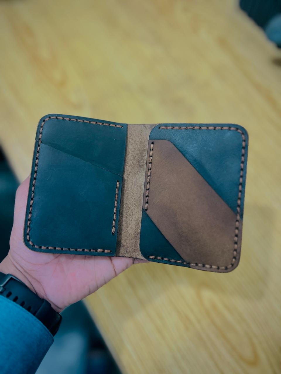 The Vertical Vogue: A Bifold Leather Wallet