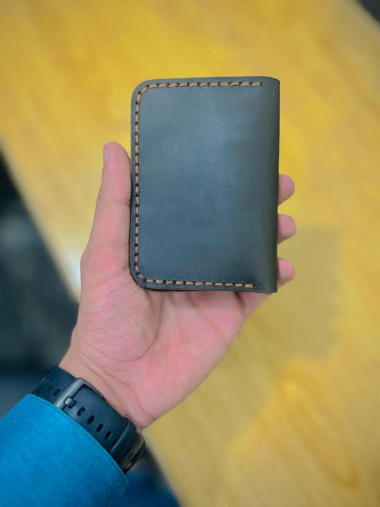 The Vertical Vogue: A Bifold Leather Wallet