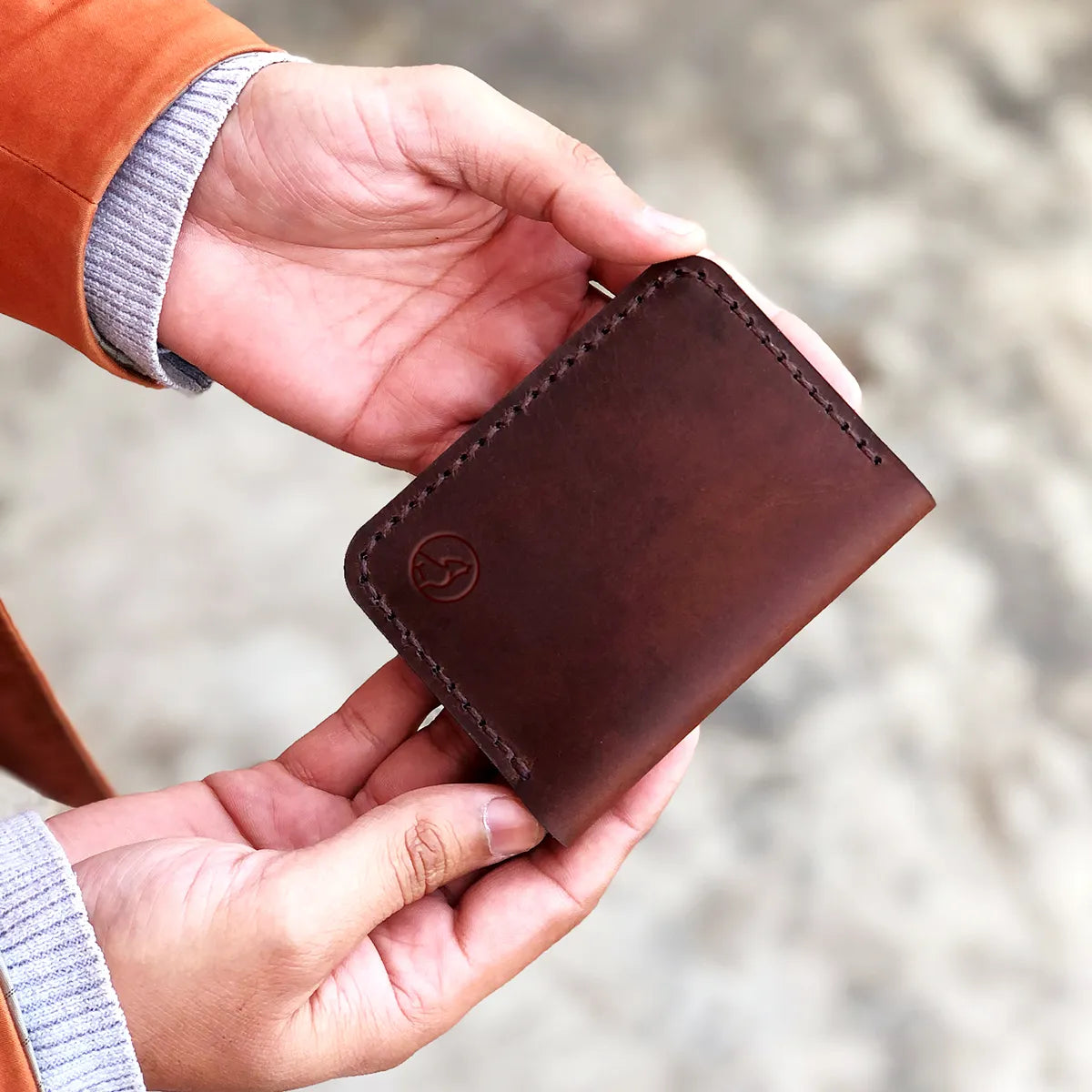 The Vertical Convenience: A Leather Bifold Wallet