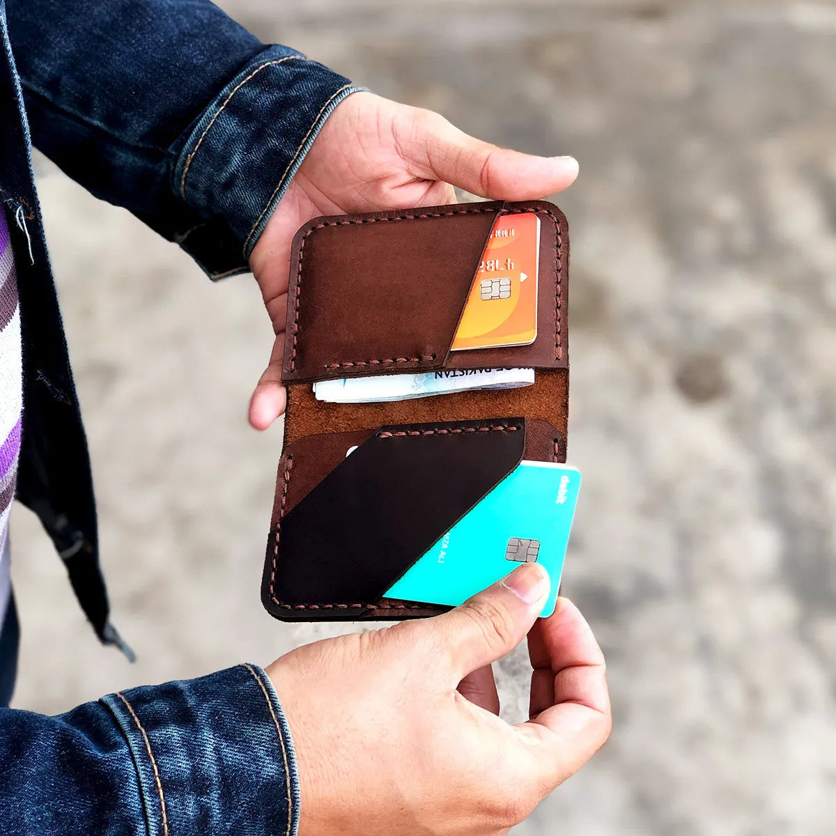 The Vertical Vogue: A Bifold Leather Wallet